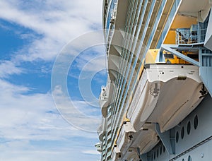 Lifeboats Under Balconies and Nce Sky