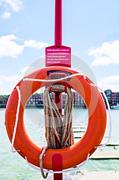 Lifebouy on post at Preston Docks in a sunny day
