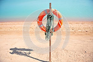 Lifebuoy on beach