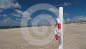 Lifebuoy on beach