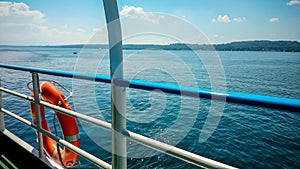 Lifebuoy on board ship at blue sky