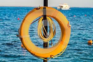 Lifebuoy hanging on a pole on the Red Sea