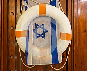 lifebuoy and israel flag on background