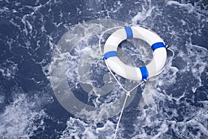 Lifebuoy, lifebelt, life saver rescue in a ocean storm full of f