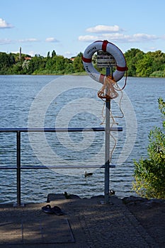 The lifebuoy is located near Biesdorfer Baggersee lake. Berlin, Germany