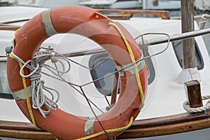 A lifebuoy or ring buoy preserver on the boat