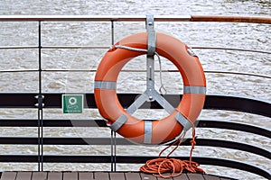 Lifebuoy ring with rope at the back of ferry boat