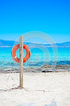 A lifebuoy, symbol of assistance, security, rescue, SOS on Golden Beach in Chrysi island, Crete, Greece