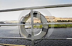 Lifebuoy tied to a ship railing