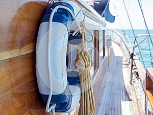 Lifebuoy on the wall of sailboat