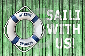 Lifebuoy on wooden floor and sail with us