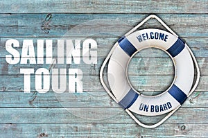 Lifebuoy on wooden floor and sailing tour