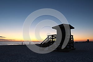 Lifegaurd station on Siesta Key, Florida at sunset