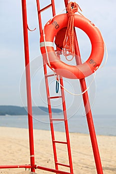 Lifeguard beach rescue equipment orange lifebuoy