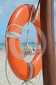 Lifeguard beach rescue equipment orange lifebuoy