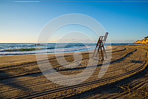 Lifeguard chair on empty beach