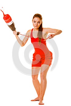 Lifeguard on duty with rescue torpedo buoy.