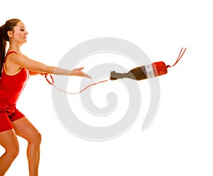 Lifeguard on duty with rescue torpedo buoy.