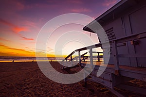 Lifeguard hut in Santa Monica beach at sunset