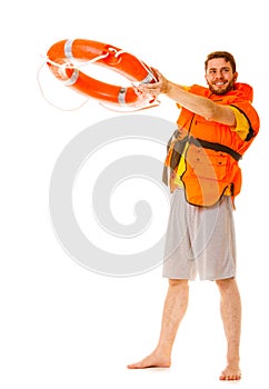 Lifeguard in life vest with ring buoy lifebuoy.