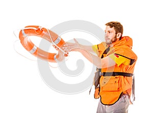 Lifeguard in life vest with ring buoy lifebuoy.