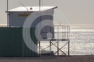 Lifeguard lookout station overlooking hazy calm sea. Seaside saf