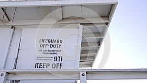 Lifeguard off duty sign in a coastguard cabin in Santa Monica beach