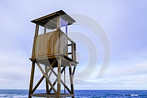 Lifeguard outpost tower on sea beach