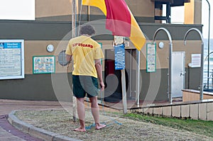 Lifeguard raising the flag at the Bronze Beach surf rescue station in Umhlanga Rocks