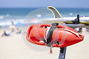 Lifeguard red buoy on a beach.
