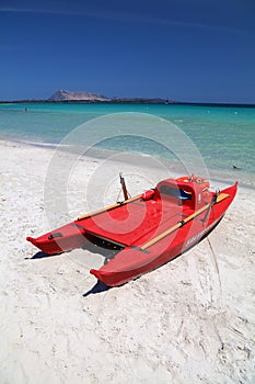 Lifeguard rescue boat in La Cinta, Sardinia photo