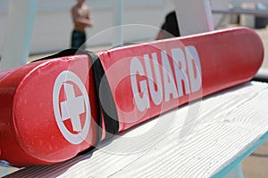 Lifeguard rescue tube on lifeguard stand