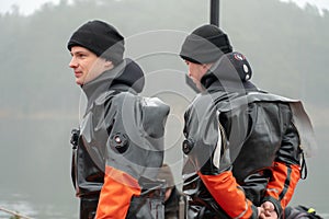 the lifeguard in the scuba suit. divers on the beach. Rescue of the drowning