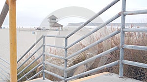 Lifeguard stand or life guard tower hut, coast surfing on California beach, USA.