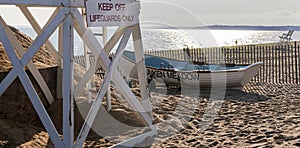 Lifeguard stand and row boat on the beach at Sunken Meadow State Park