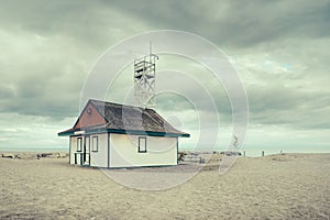 A lifeguard station against an overcast sky