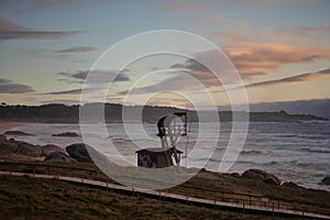 Lifeguard tower on the beach during the sunset in Corrubedo Natural Park in Spain photo