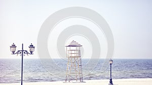 Lifeguard tower on an empty beach.