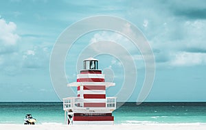 Lifeguard Tower Miami Beach, Florida. Atlantic Ocean background.