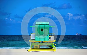 Lifeguard Tower Miami Beach, Florida. Sunny summer day, with blue sky and Atlantic Ocean.