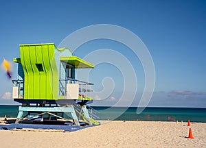 Lifeguard tower Miami Beach. Long exposure to blur ghost people