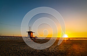 Lifeguard tower in Newport Beach at sunset