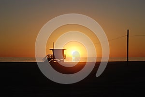 Lifeguard tower station at sunset