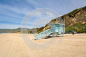 Lifeguard tower on the Zuma Beach in Malibu, California photo