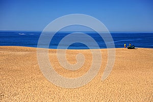 Lifeguards on the beach of nazare resort on winter