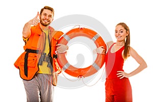 Lifeguards in life vest with ring buoy. Success.