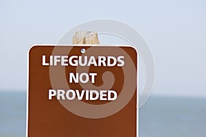 Lifeguards not provided sign