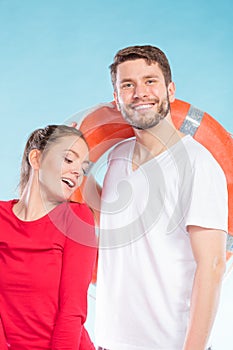 Lifeguards with ring buoy lifebuoy.