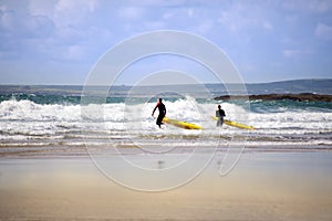 Lifeguards training in the surf