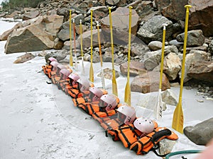 Lifejackets and oars lined up